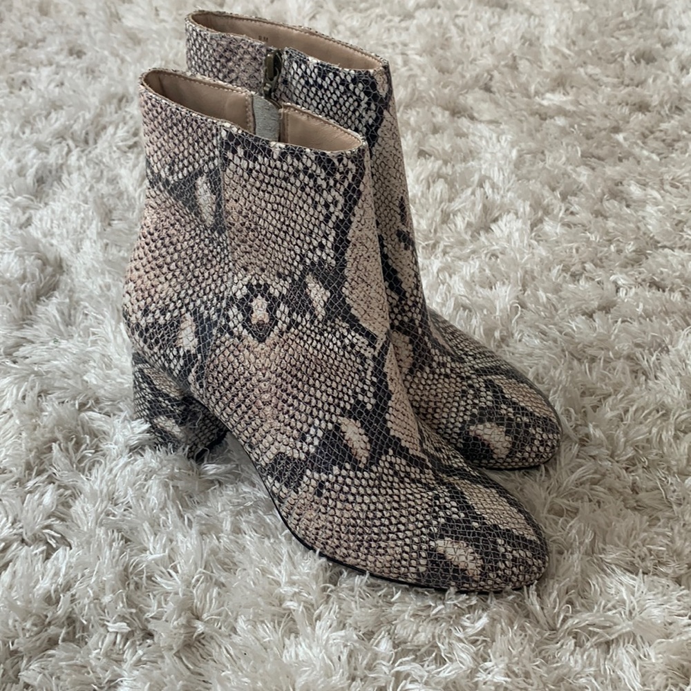 Snakeskin style boots with heel